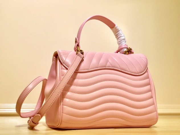 Bikini khoét ngực màu trắng buộc nơ eo 